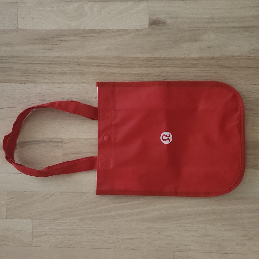 Lululemon Athletica Red Small Tote Bag With Fabric Straps And Snap Closure